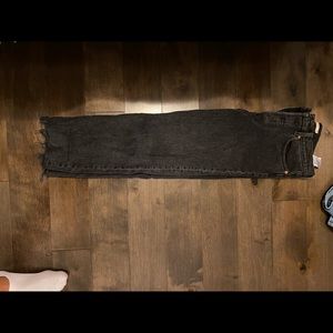 Distressed black straight leg Levi jeans